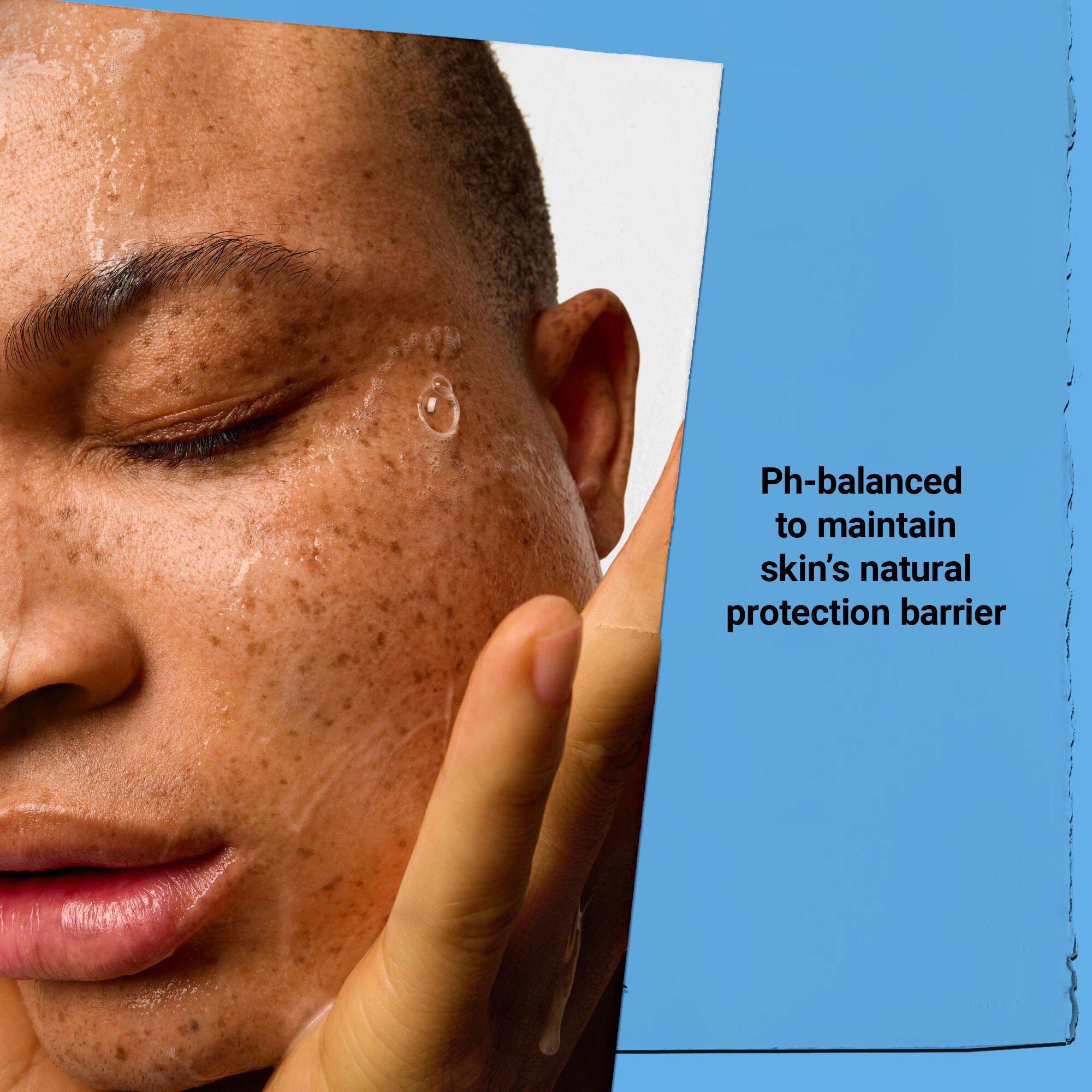 model with face wash bubble on cheek. Ph-balanced to maintain skin's natural protection barrier 