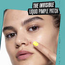 the invisible liquid pimple patch. model adding product to face