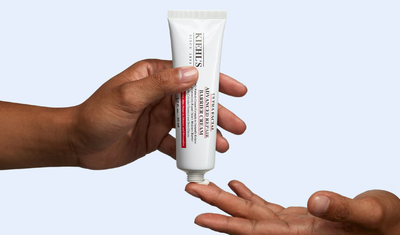 Applying Ultra Facial Barrier Cream to the fingertips
