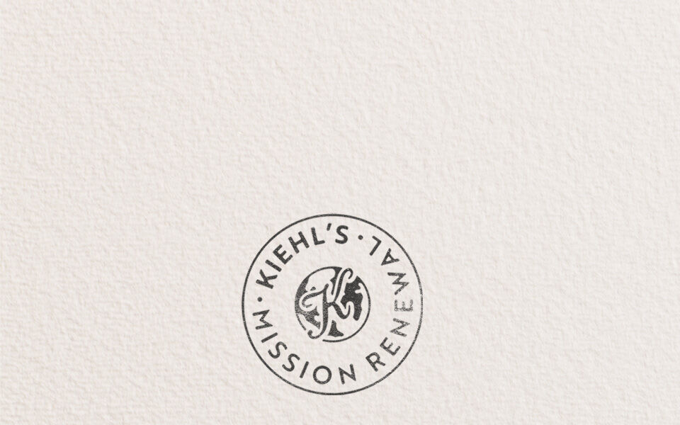  Kiehl’s Mission Renewal banner featuring a circular stamp logo and text reading, "Our imperfect journey to drive a more circular economy," promoting the brand's sustainability and circular economy initiative.