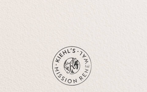 Kiehl’s Mission Renewal banner featuring a circular stamp logo and text reading, "Our imperfect journey to drive a more circular economy," promoting the brand's sustainability and circular economy initiative.