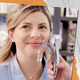 Model holding skin reader tool to face