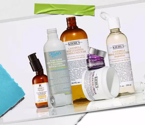Assorted Kiehl’s skincare products, featuring Calendula cleanser, toner, and Ultra Facial Cream, alongside the My Kiehl’s Rewards heart logo.