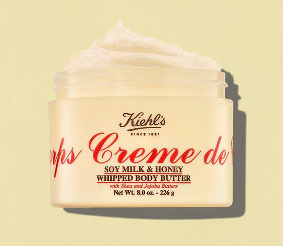 Open jar of Kiehl’s Creme de Corps Soy Milk & Honey Whipped Body Butter