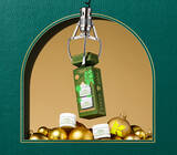 2 ultra facial creams on green leather background 