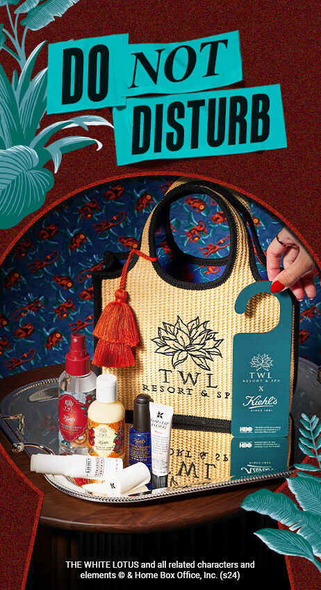 Do not disturb. Image of the white lotus x kiehl's set with Bag and products displayed 