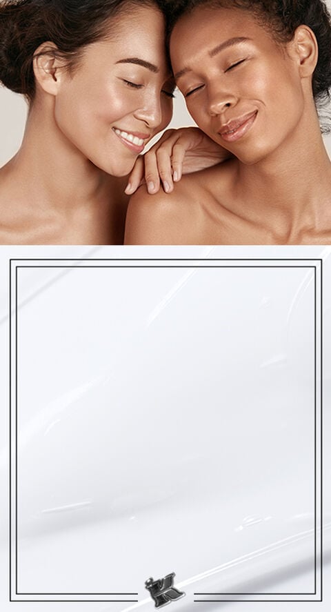 A photo of two women with different skin tones