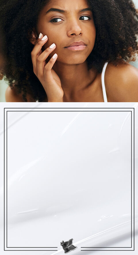 A woman toucher her face