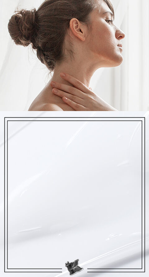 A woman touching her neck