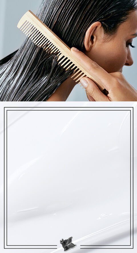 A woman combing her hair