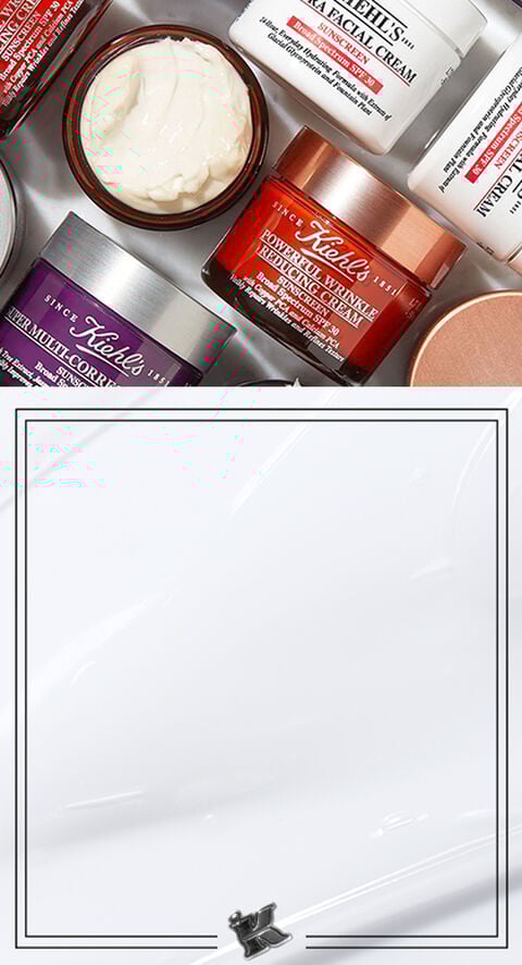 A photo of lots of Kiehl's face moisturizers