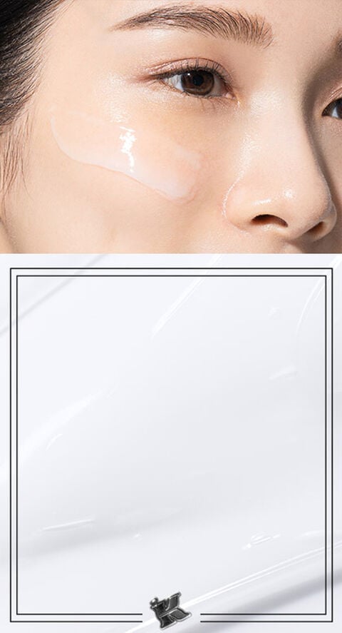 A woman with a light serum on her face.