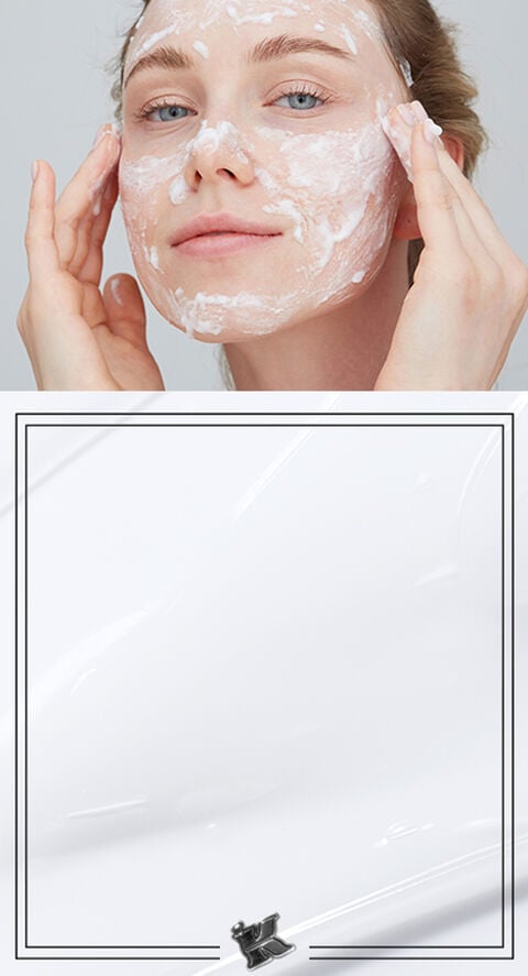 A woman with soap on her face