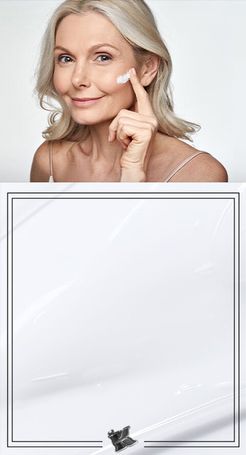 A mature person with a cream on their face