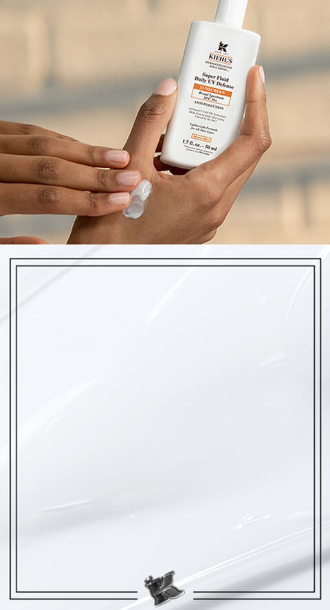 Sunscreen being applied on hand