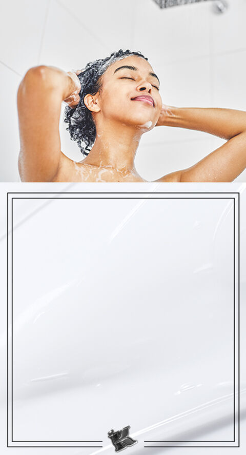 A woman shampooing her hair