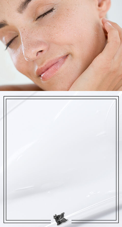 A woman holding her face