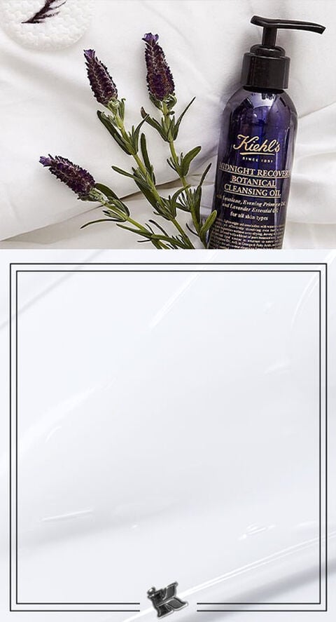 An image of fresh lavender next to Kiehl's Midnight Recovery Botanical Cleansing Oil