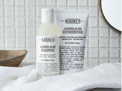 A product shot of Kiehl's Amino Acid Conditioner and Amino Acid Shampoo